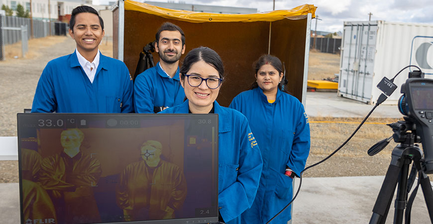 Professor Jeanette Cobian-Iñiguez, front, and her students study heat transfer in fire in her lab.